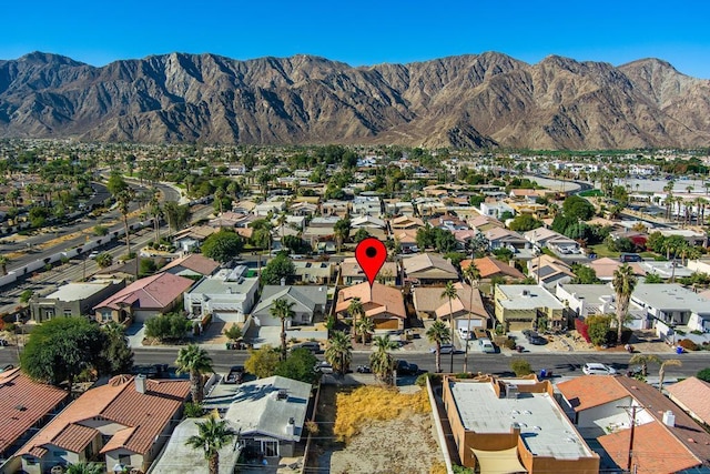 bird's eye view with a mountain view