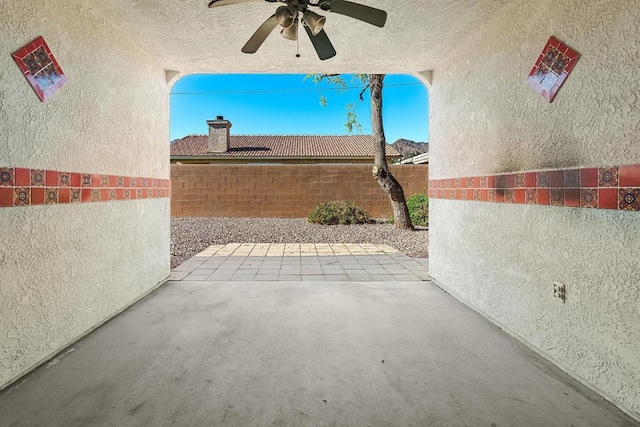 view of patio / terrace featuring ceiling fan