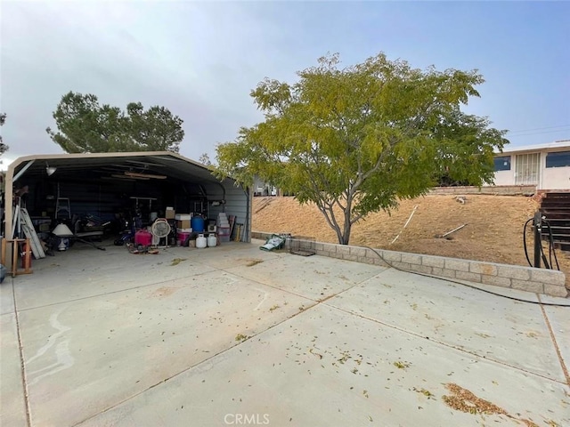 view of patio / terrace featuring a carport