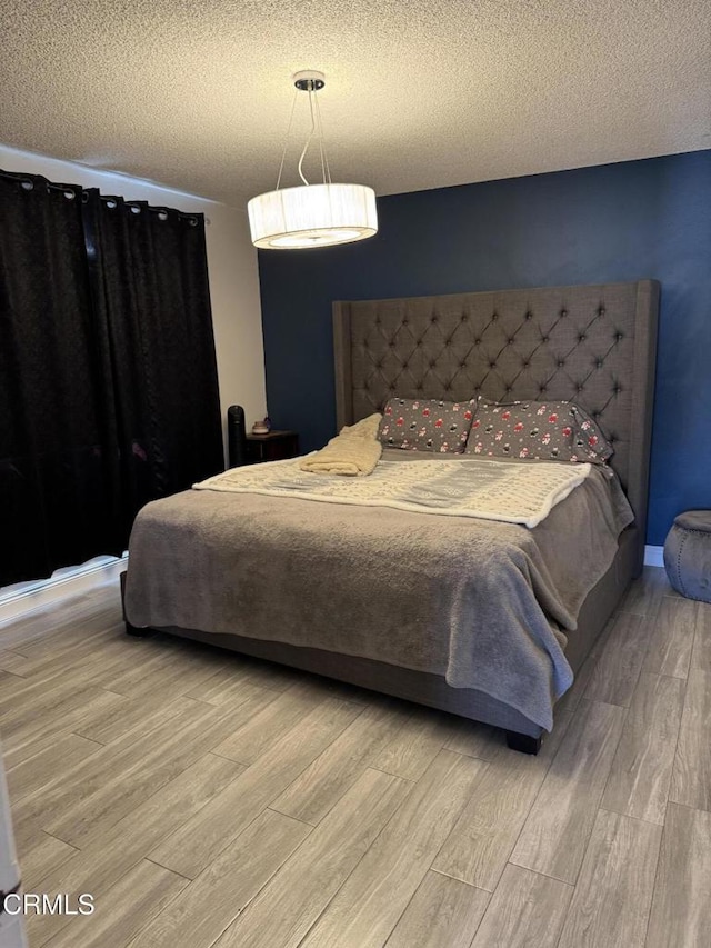 bedroom with a textured ceiling