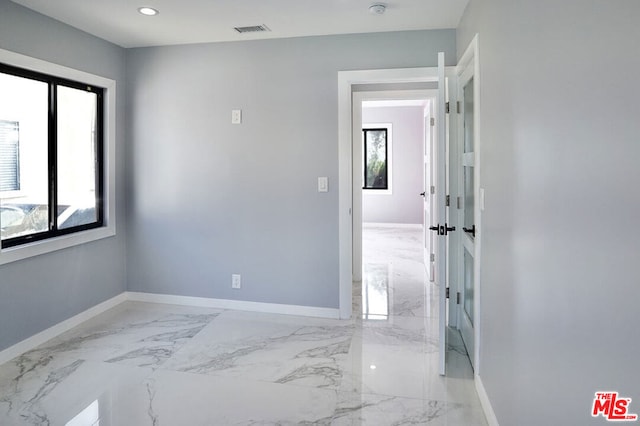 empty room featuring french doors