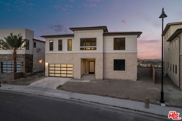 view of front of house with a garage