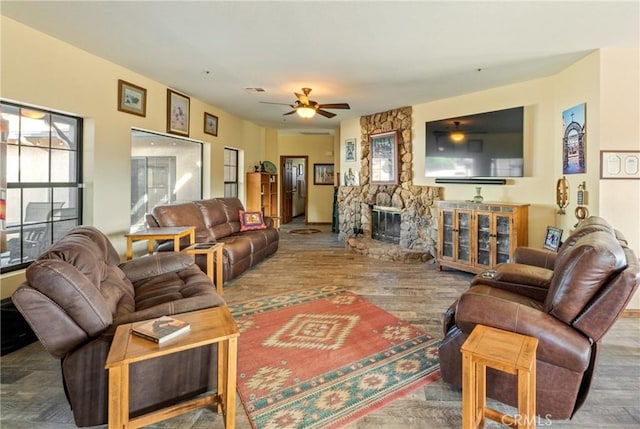 6535 Juniper Crest Rd, Agua Dulce, CA 91390 - living area with ceiling fan, wood finished floors, and a fireplace
