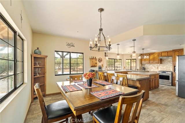 dining area featuring a chandelier