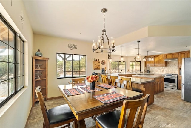 6535 Juniper Crest Rd, Agua Dulce, CA 91390 - dining space featuring a chandelier and light wood-type flooring
