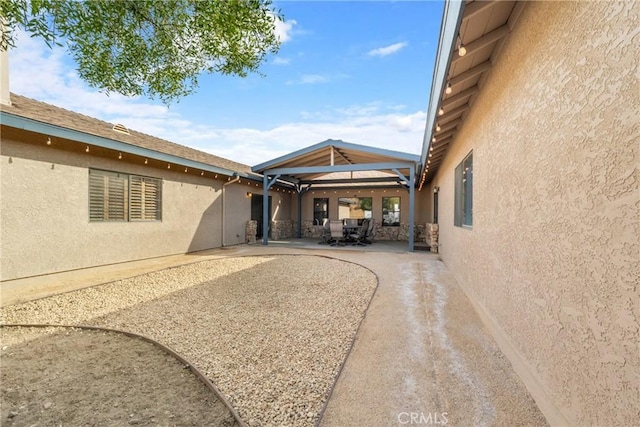 6535 Juniper Crest Rd, Agua Dulce, CA 91390 - view of home's exterior with a gazebo, stucco siding, and a patio area
