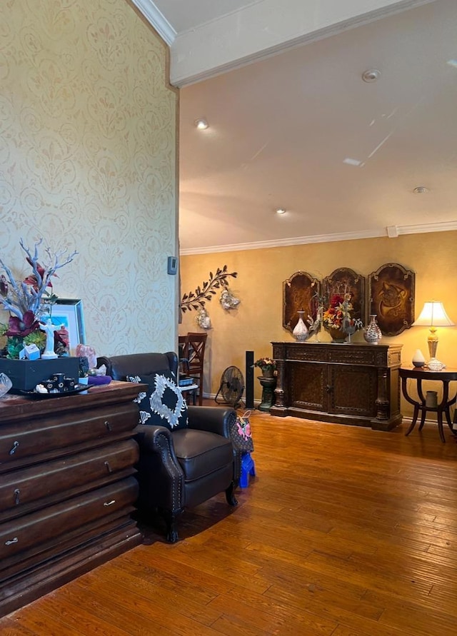 bedroom with hardwood / wood-style flooring and ornamental molding