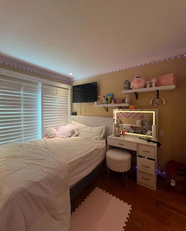 bedroom featuring dark wood-type flooring