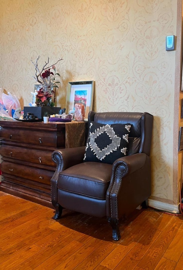 living area with hardwood / wood-style floors