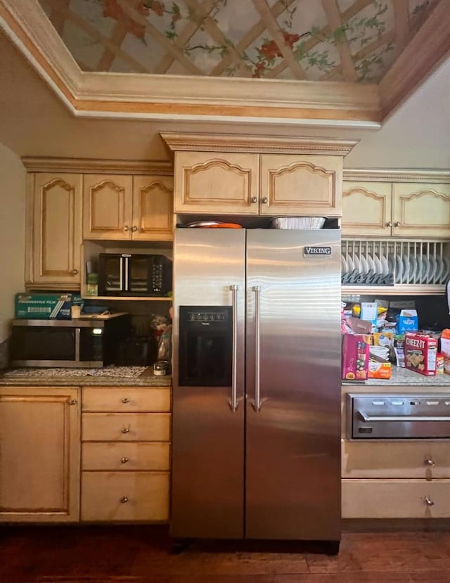 kitchen with crown molding, stainless steel appliances, and light brown cabinetry