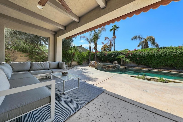 view of patio / terrace with a pool with hot tub, an outdoor living space, and ceiling fan