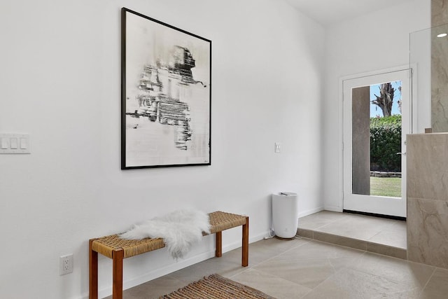 entryway featuring light tile patterned floors