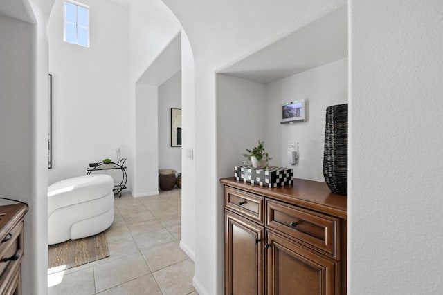 interior space featuring light tile patterned floors