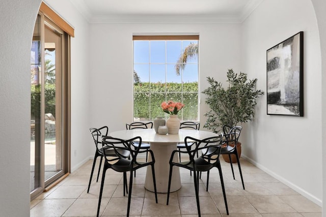 tiled dining space with crown molding