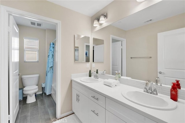 full bath featuring visible vents, a sink, and toilet