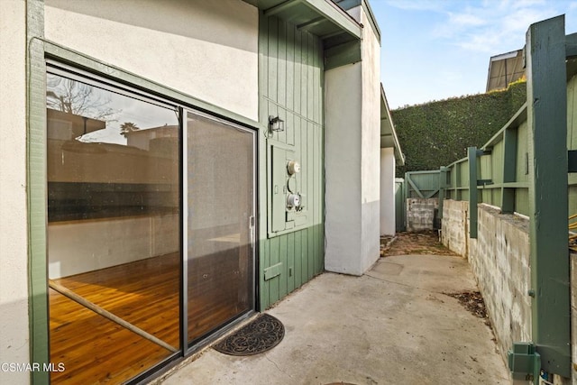 doorway to property featuring a patio