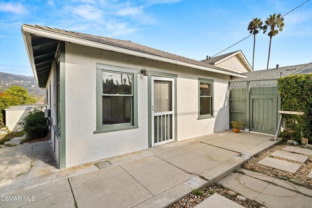 back of house featuring a patio area