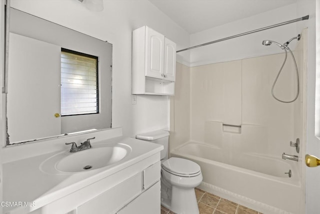 full bathroom with toilet, vanity, and shower / bathtub combination