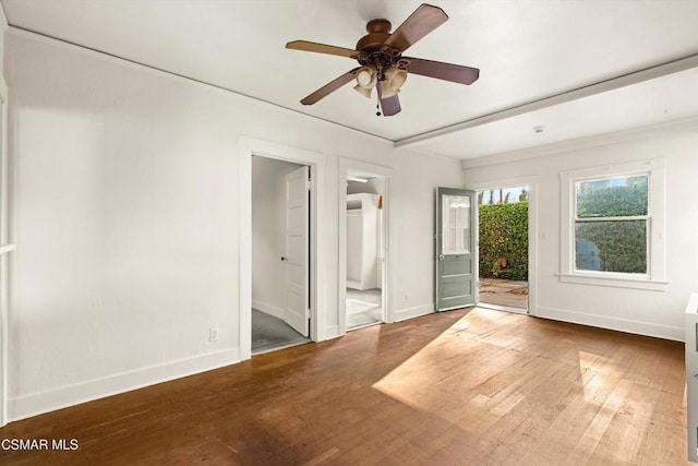 spare room with ceiling fan, wood-type flooring, and ornamental molding