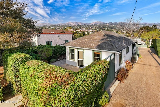 view of home's exterior featuring a mountain view