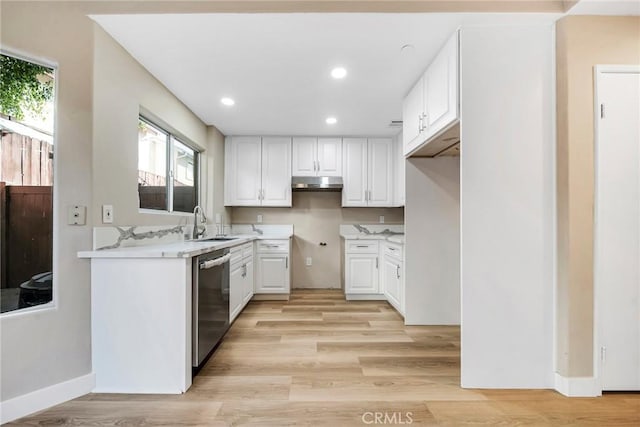 kitchen featuring white cabinetry, dishwasher, light hardwood / wood-style floors, and sink