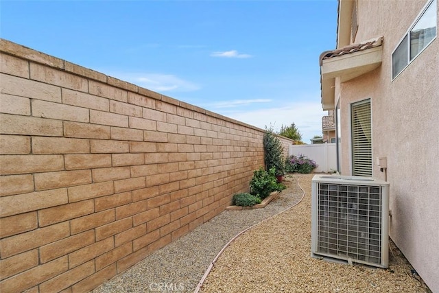 view of yard with central AC