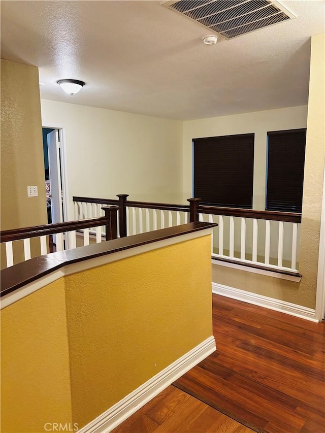 hall featuring wood-type flooring