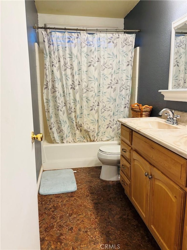 full bathroom featuring vanity, toilet, and shower / tub combo with curtain