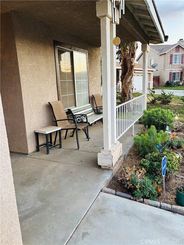 view of patio featuring covered porch