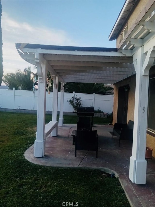 view of patio / terrace featuring a pergola and grilling area