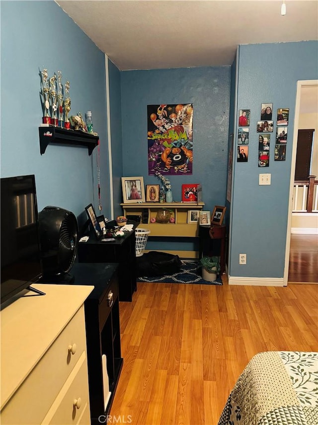 bedroom featuring light hardwood / wood-style flooring