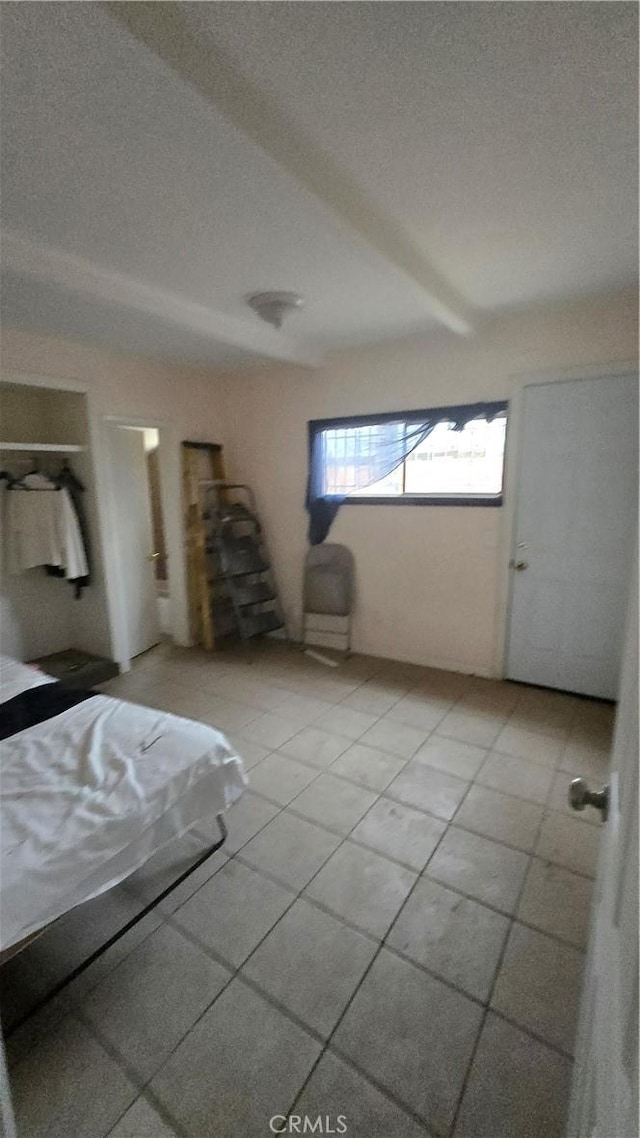 unfurnished bedroom featuring a textured ceiling