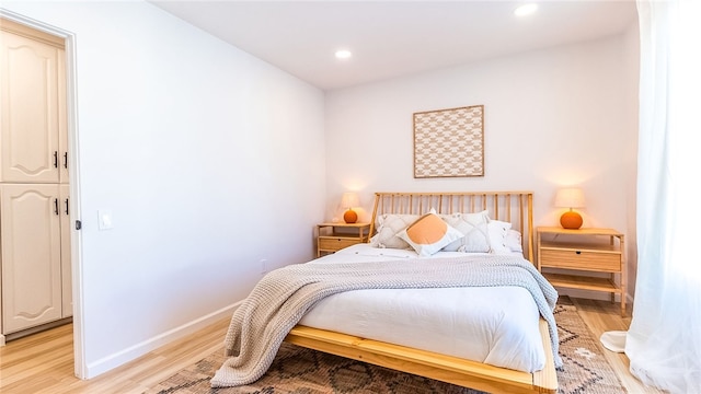 bedroom featuring light hardwood / wood-style flooring