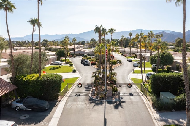 surrounding community featuring a mountain view