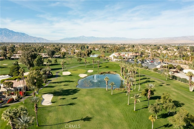 aerial view featuring a water and mountain view