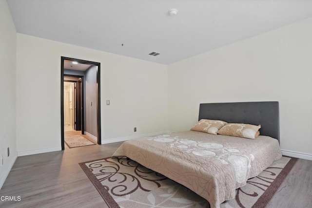 bedroom featuring light hardwood / wood-style flooring