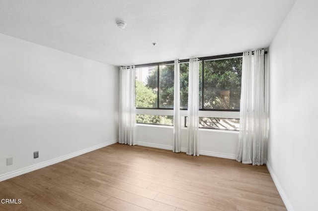 empty room featuring light hardwood / wood-style flooring