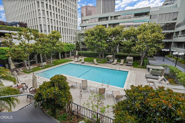 view of pool featuring a patio area