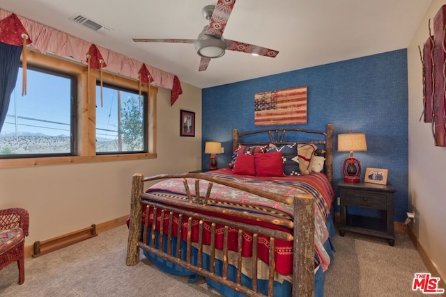 bedroom featuring carpet flooring and ceiling fan