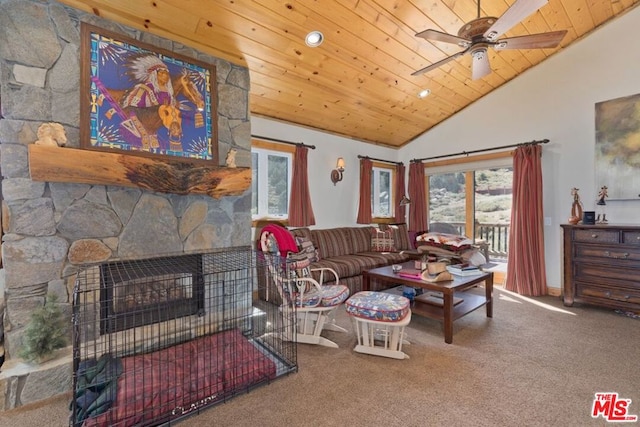 living room with carpet flooring, wood ceiling, ceiling fan, high vaulted ceiling, and a fireplace