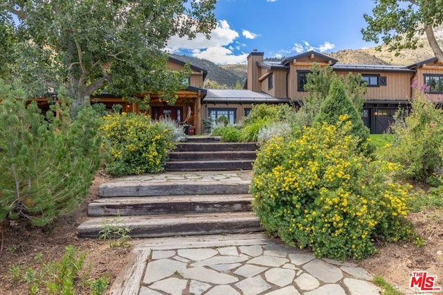 doorway to property featuring a mountain view