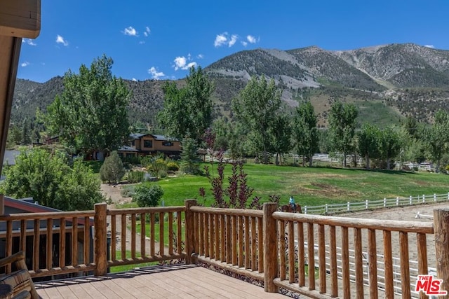 wooden terrace with a mountain view