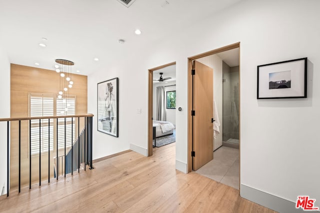 hallway featuring light hardwood / wood-style flooring