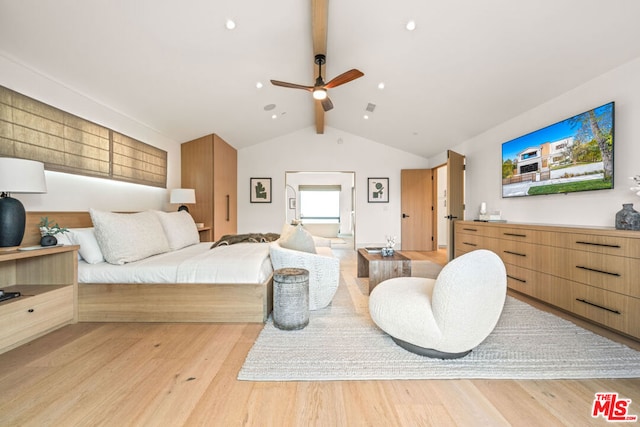 bedroom with ceiling fan, vaulted ceiling with beams, and light hardwood / wood-style floors