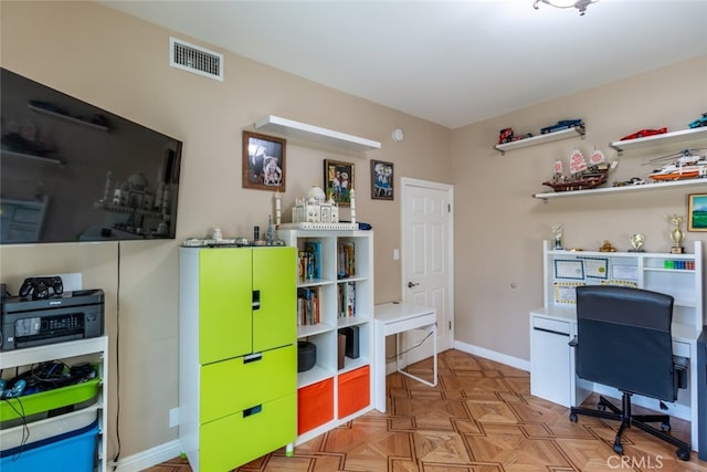 office area featuring light parquet floors