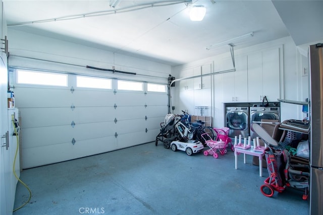 garage featuring separate washer and dryer