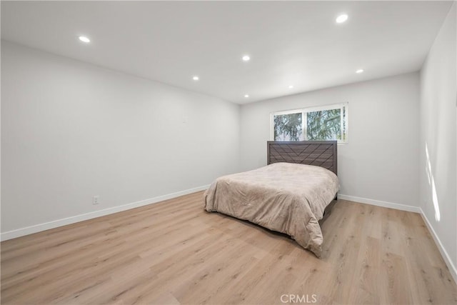 bedroom featuring light wood-type flooring