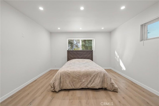 bedroom featuring light hardwood / wood-style floors