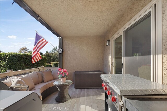 balcony featuring an outdoor living space