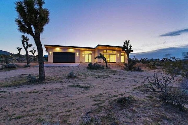 view of front of house with a garage